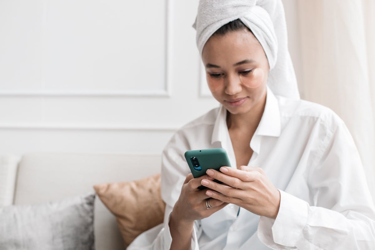 Woman Holding a Mobile Phone